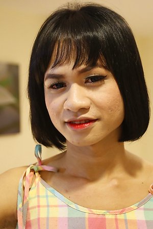 19yo horny Thai ladyboy does a striptease for white tourist