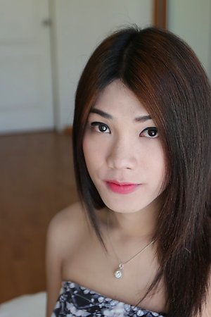 20yo Thai shemale does a striptease and gets fucked by white cock