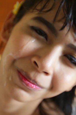 Small-tittied 18 yr old Thai Ladyboy gets huge facial from white tourist