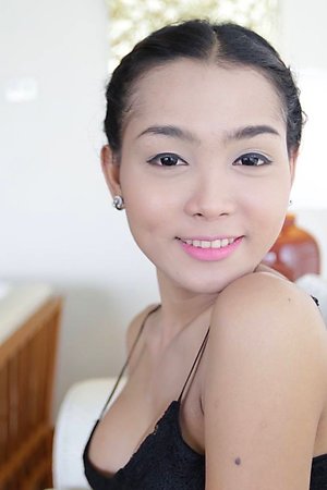 22 year old busty Thai ladyboy gets naked and poses for tourist